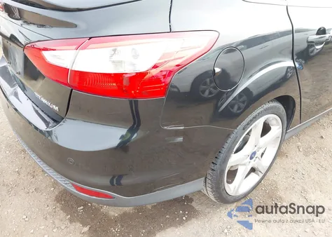 2014 Ford Focus Titanium from USA, damaged, VIN 1FADP3J27EL374518